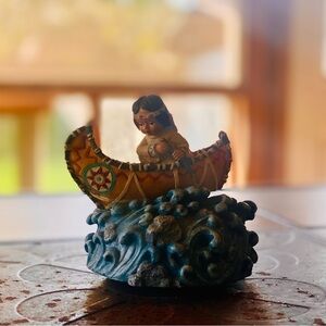 Native-Inspired “Indian Love Call” Music Box Canoe with Blue and Yellow Accents